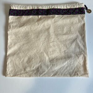 Tory Burch Cream DustBag with Gold Tone Metal Tory Burch Medallion Tag Charm